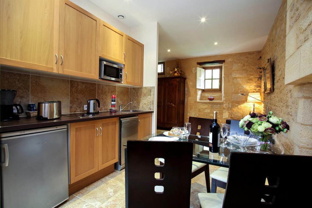 Apartamento Le Grenier Du Chapitre Sarlat Habitación foto